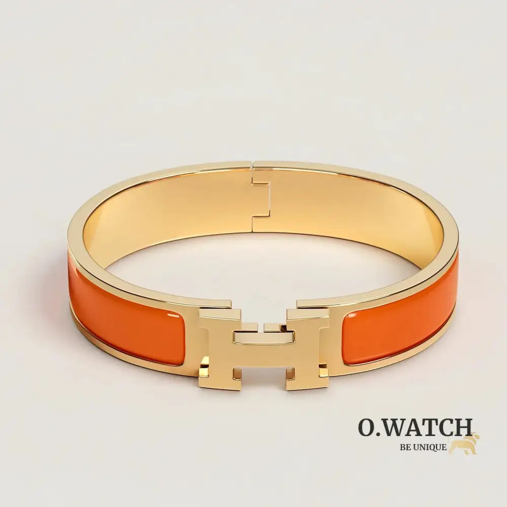 BRACELET HERMES CLIC H ORANGE FRUITÉ DORÉ