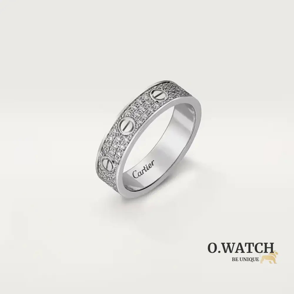 Ensemble deux pièces de la collection LOVE : un bracelet pavé classique et une bague pavée. Bracelet Cartier