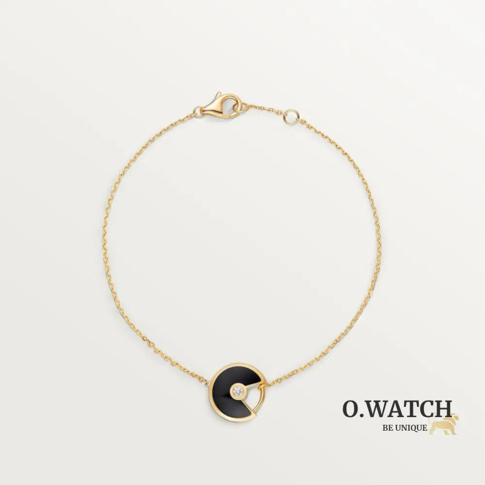 GOURMETTE CARTIER AMULETTE NOIR ONYX GOLD