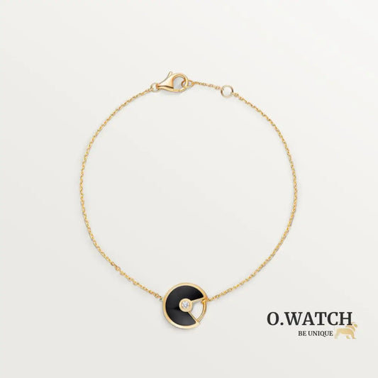 GOURMETTE CARTIER AMULETTE NOIR ONYX GOLD